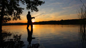 A Stunning Fishing Bait In Action On Crystal Clear Waters Wallpaper