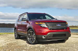 A Stunning Ford Explorer On A Picturesque Road Wallpaper