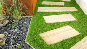 A Stunning Garden Design Featuring A Vibrant Combination Of Flowers And Greenery Wallpaper