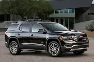 A Stunning Gmc Acadia In A Dynamic Outdoor Setting Wallpaper
