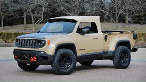 A Stunning Jeep Comanche On An Off-road Adventure Wallpaper