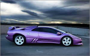 A Stunning Lamborghini Diablo In Vibrant Yellow Wallpaper