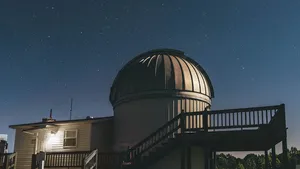 A Stunning Night Sky Above The Observatory Wallpaper