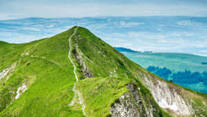 A Stunning Panoramic View Of Nature's Sprawling Wilderness Wallpaper