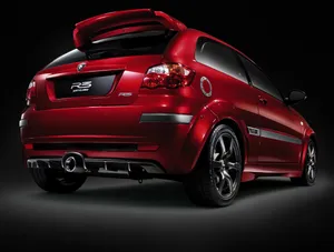 A Stunning Proton Car In Motion Wallpaper