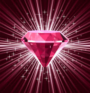 A Stunning Red Diamond Shimmering In The Spotlight Wallpaper