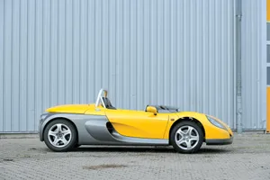 A Stunning Renault Sport Spider Showcased On The Racetrack. Wallpaper