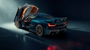 A Stunning Rimac Electric Supercar On An Open Road. Wallpaper