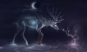 A Stunning Shot Of A Majestic Deer In Its Natural Environment Wallpaper