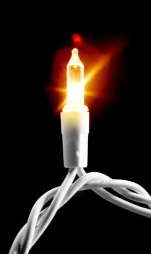 A Stunning Sunset Fiery Sky Over Sandy Beach. Wallpaper