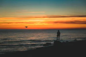 A Stunningly Peaceful View Of A Golden Sunset Wallpaper