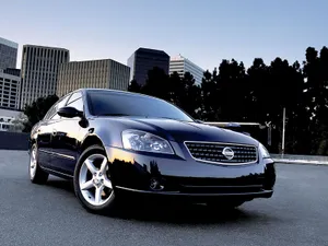 A Stylish Nissan Altima Sedan Showcasing Its Sleek Design And Modern Features Wallpaper