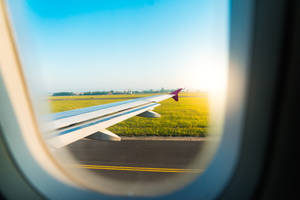 A Sunny Plane Window Sight Wallpaper