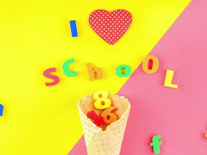 A Sunrise Over A Lush Mountain Valley Wallpaper