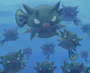 A Swarm Of Qwilfish Advancing In Ocean Depths Wallpaper