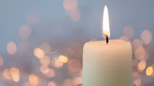 A Symphony Of Candles Illuminating The Darkness Wallpaper