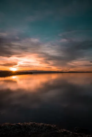 A Symphony Of Colors At Dusk Wallpaper