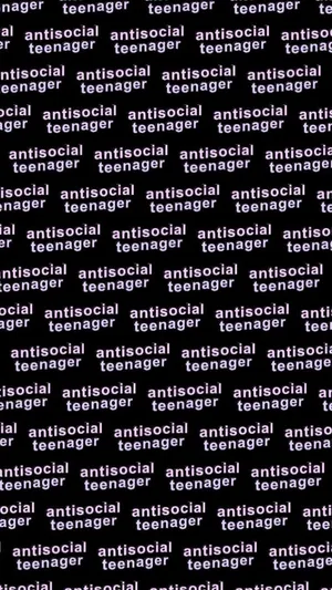 A Teenage Boy Chilling In Bed Wallpaper