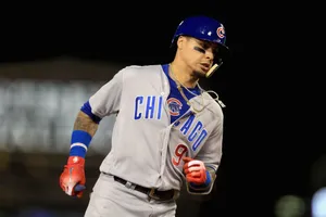 A Thrilling College Baseball Game Wallpaper