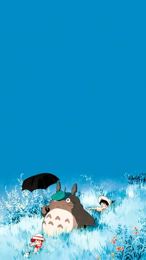 A Totoro And A Tonkatsu In The Grass Wallpaper