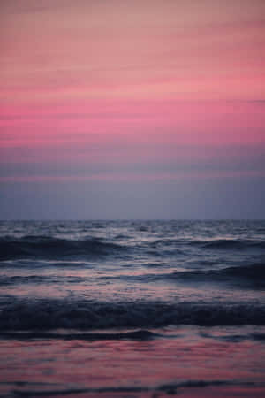 A Tranquil Blue Beach Sky Wallpaper