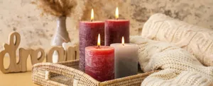 A Tranquil Evening Illuminated By Scented Candles Wallpaper