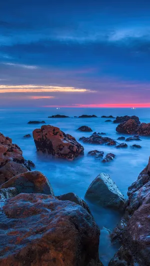 A Tranquil Summer Afternoon At The Beach Wallpaper
