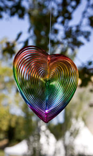 A Tree In The Early Morning Surrounded By A Beautiful Sunrise. Wallpaper