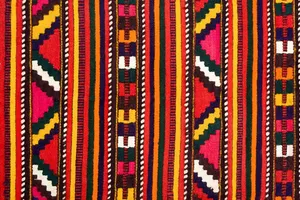 A Unique And Colorful Textile Art Piece Wallpaper