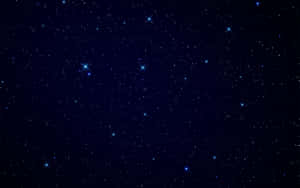 _ A Vibrant Blue Star Shines Brightly In The Night Sky._ Wallpaper