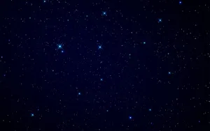 _ A Vibrant Blue Star Shines Brightly In The Night Sky._ Wallpaper