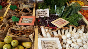 A Vibrant Day At The Farmers Market Wallpaper