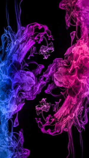 A Vibrant Display Of Color Billowing Into The Sky Wallpaper