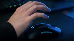 A Vibrant Gaming Mouse With Customizable Rgb Lighting Wallpaper