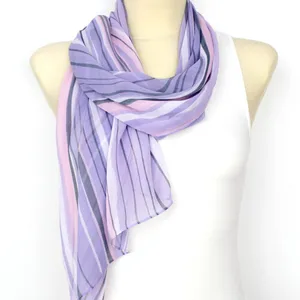 A Vibrant Pattern On A Purple Scarf Wallpaper