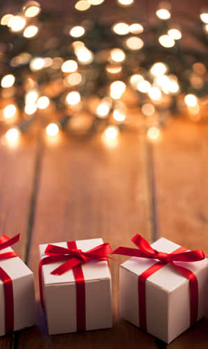 A Vibrant Sunset Behind A Rocky Looking Mountain Wallpaper