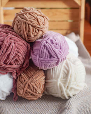 A Vibrant Symphony Of Colorful Yarns Wallpaper