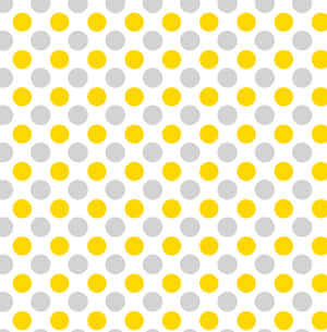 A Vibrant Yellow Polka Dot Pattern On A High-quality Wallpaper Wallpaper