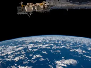 A View Of The International Space Station Orbiting Earth Wallpaper