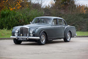 A Vintage Bentley S2 In Pristine Condition Wallpaper