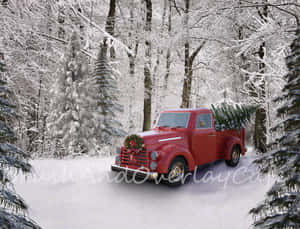 A Vintage Truck During Christmas Time. Wallpaper