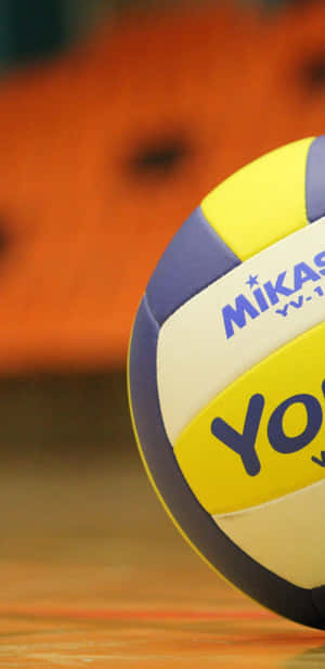 A Volleyball Ball On A Court Wallpaper