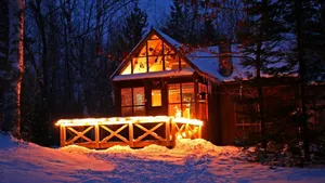 A Warm And Inviting Cozy Winter Cabin Wallpaper