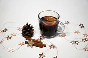 A Warm And Inviting Glass Of Mulled Wine Wallpaper