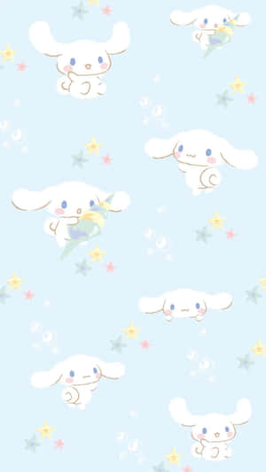 A White And Blue Pattern With White Bunnies Wallpaper