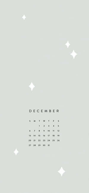 A White Calendar With Stars On It Wallpaper