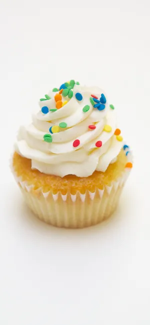 A White Cupcake With A White Frosting Wallpaper