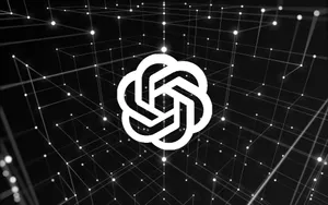 A White Logo With A Black Background Wallpaper