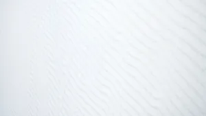 A White Wall With A Pattern Of Waves Wallpaper