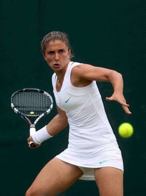 A Woman Playing Tennis Wallpaper